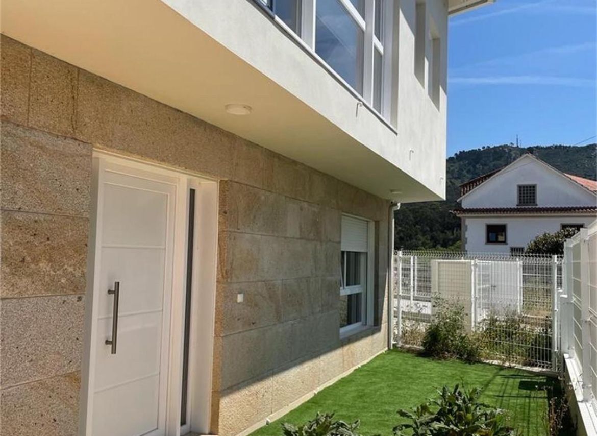 Exterior view of Single-family semi-detached for sale in Cangas   with Heating, Terrace and Storage room