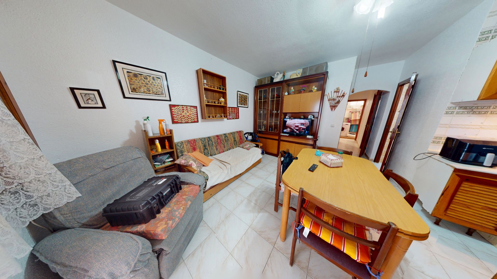 Sala d'estar de Casa adosada en venda en Torrevieja amb Aire condicionat, Jardí privat i Traster