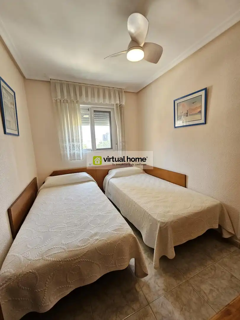 Bedroom of Flat for sale in Benidorm  with Air Conditioner, Terrace and Furnished