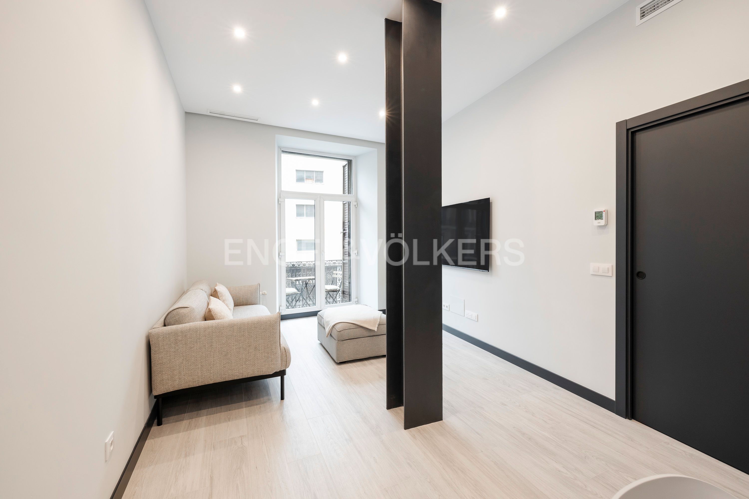 Sala d'estar de Apartament en venda en  Madrid Capital amb Aire condicionat, Calefacció i Moblat