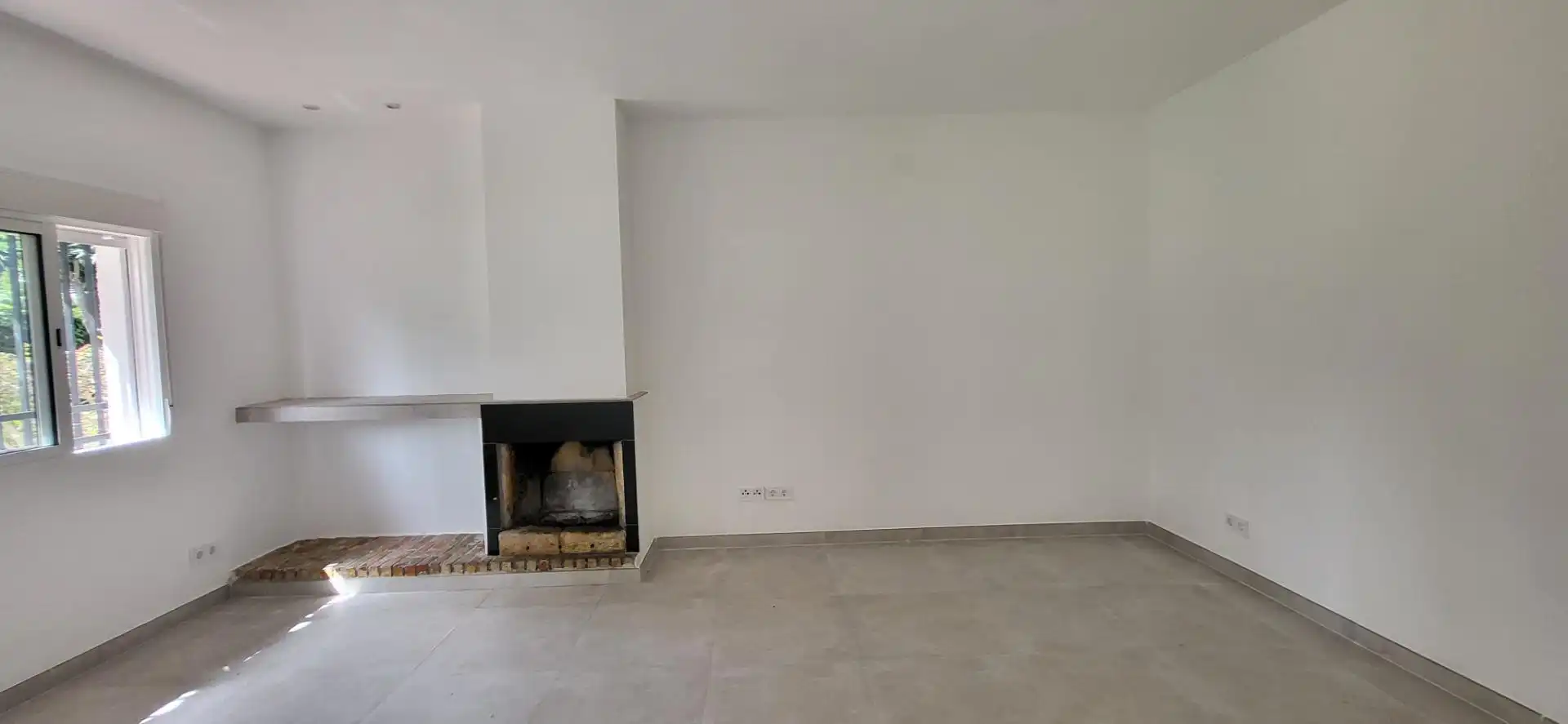 Sala de estar de Casa adosada en venta en Marbella con Piscina comunitaria