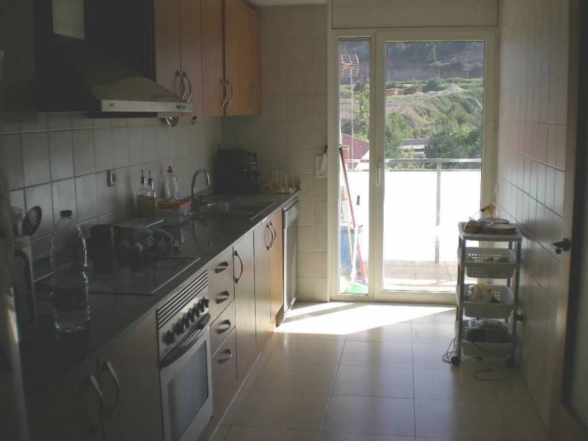 Kitchen of Flat for sale in Sallent  with Air Conditioner, Heating and Balcony