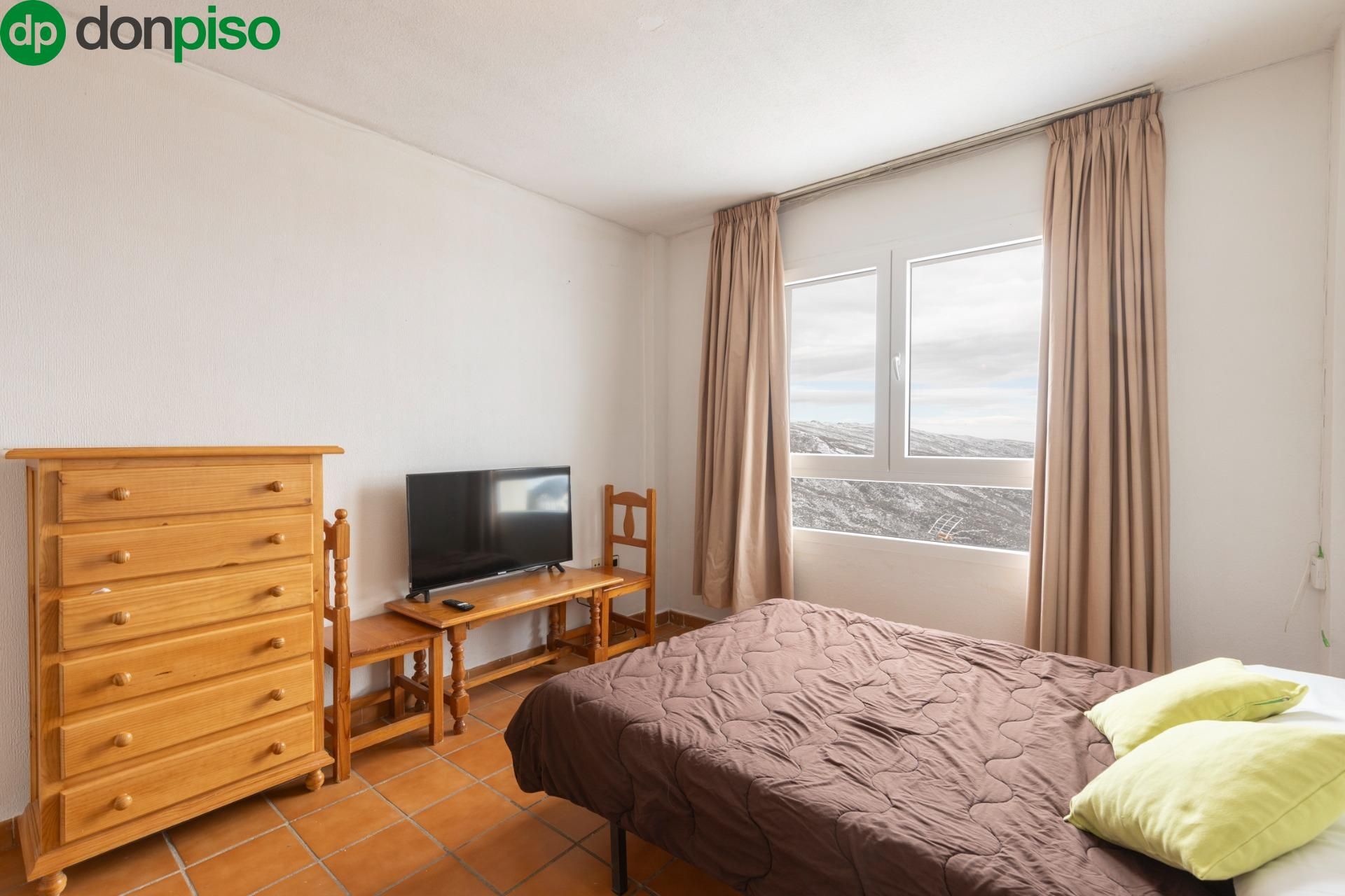 Dormitori de Apartament en venda en Sierra Nevada amb Calefacció