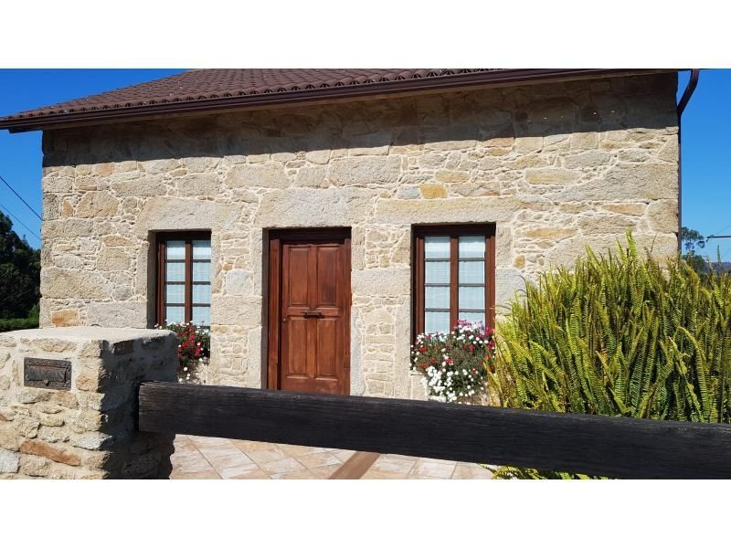 Vista exterior de Casa o xalet en venda en Catoira amb Jardí privat, Parquet i Traster