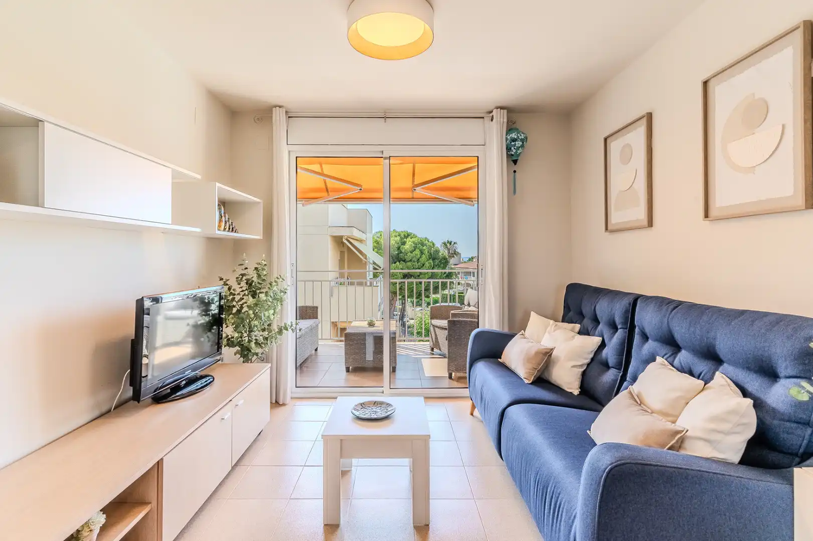 Sala de estar de Piso en venta en L'Ampolla con Aire acondicionado, Calefacción y Jardín privado