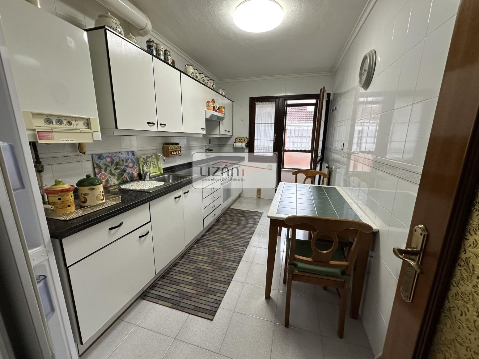 Kitchen of Flat for sale in Oviedo   with Heating, Parquet flooring and Furnished