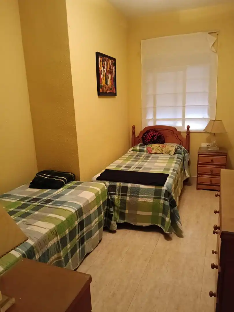 Dormitori de Apartament de lloguer en Cullera amb Aire condicionat, Terrassa i Moblat