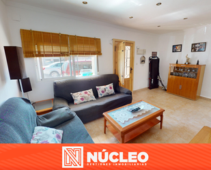 Sala d'estar de Casa adosada en venda en El Campello amb Aire condicionat, Terrassa i Balcó