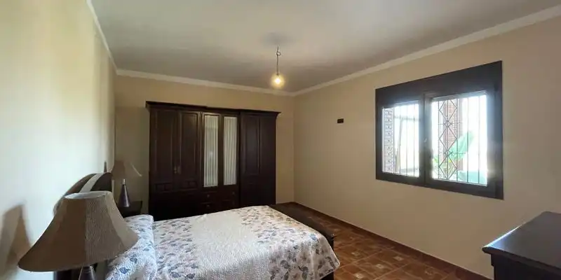 Dormitori de Casa o xalet en venda en Loja amb Aire condicionat, Jardí privat i Terrassa