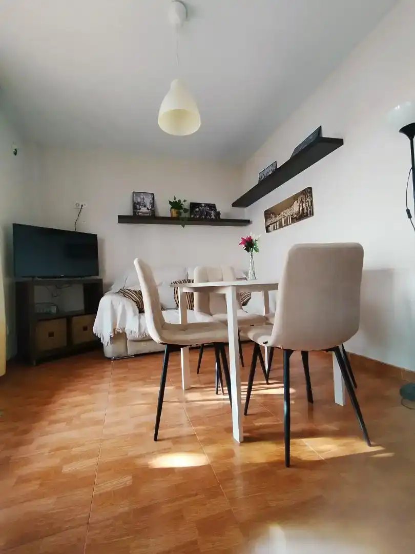 Sala d'estar de Casa adosada per a compartir en Córdoba amb Aire condicionat, Moblat i Forn