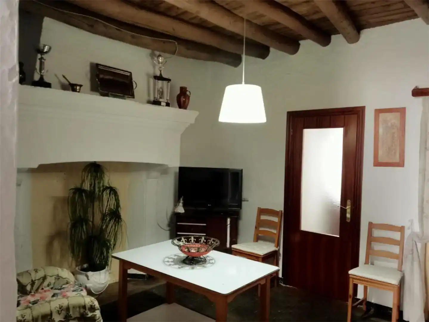 Sala d'estar de Casa adosada en venda en Cala amb Jardí privat i Traster