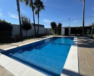 Swimming pool of Country house for sale in Utrera  with Air Conditioner, Private garden and Storage room