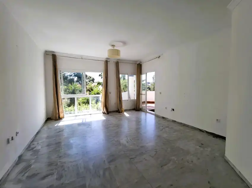 Living room of Flat for sale in Marbella  with Air Conditioner, Private garden and Terrace