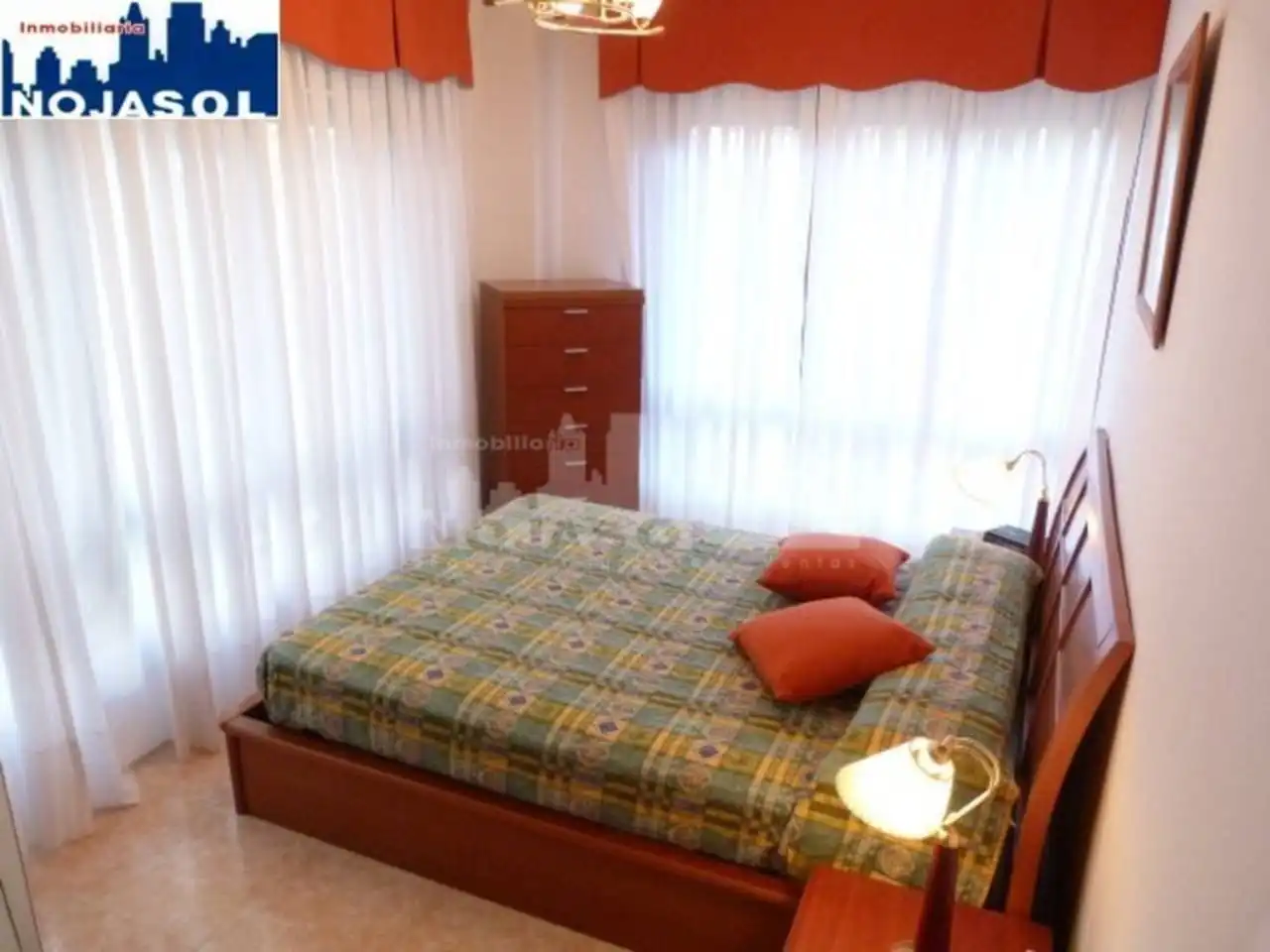 Dormitori de Apartament de lloguer en Noja amb Calefacció, Jardí privat i Terrassa