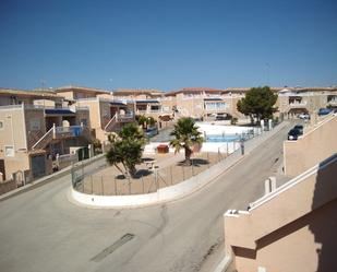 Vista exterior de Casa adosada de lloguer en Pilar de la Horadada amb Terrassa, Forn i Piscina comunitària