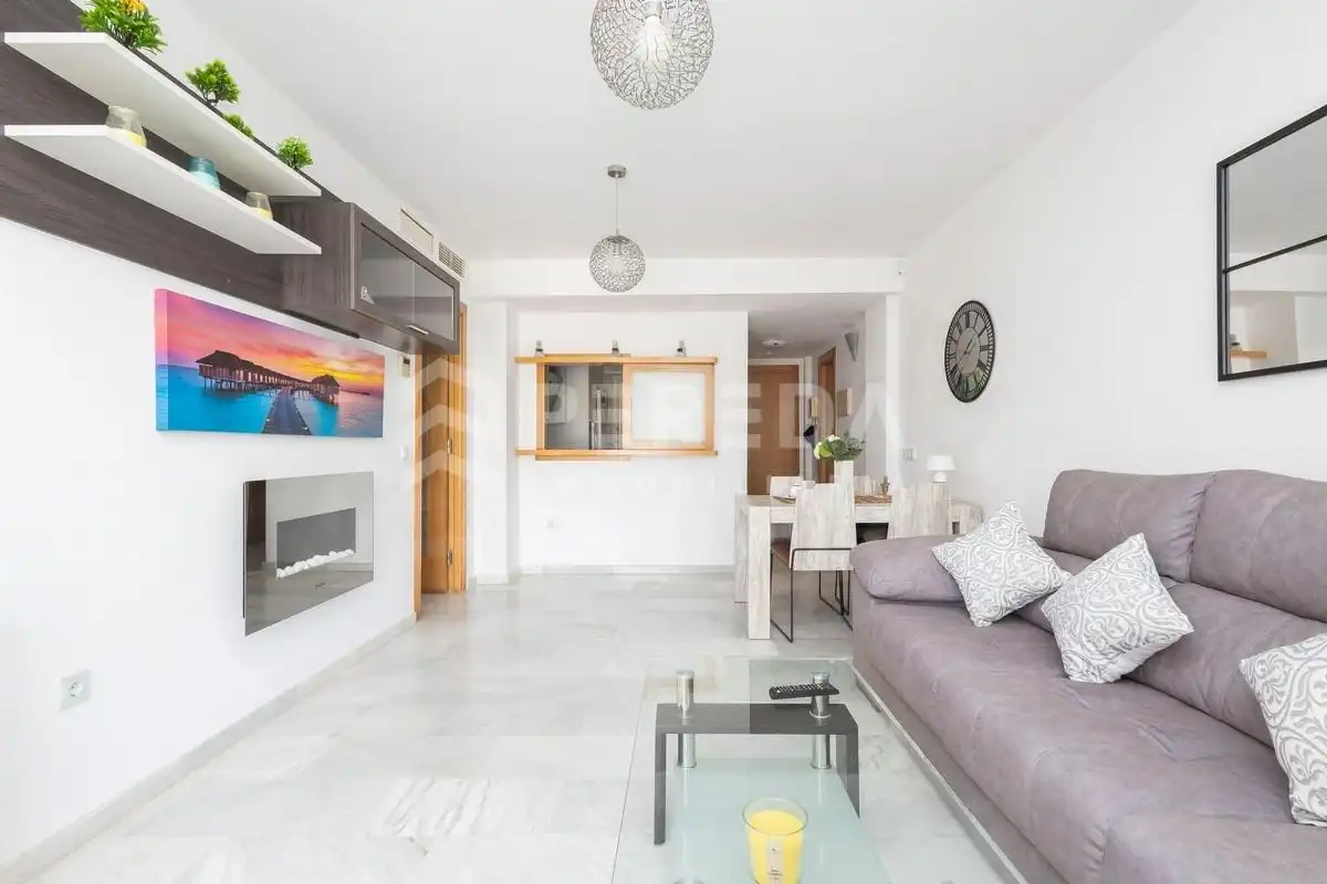Living room of Ground floor for sale in Roquetas de Mar  with Air Conditioner, Private garden and Terrace