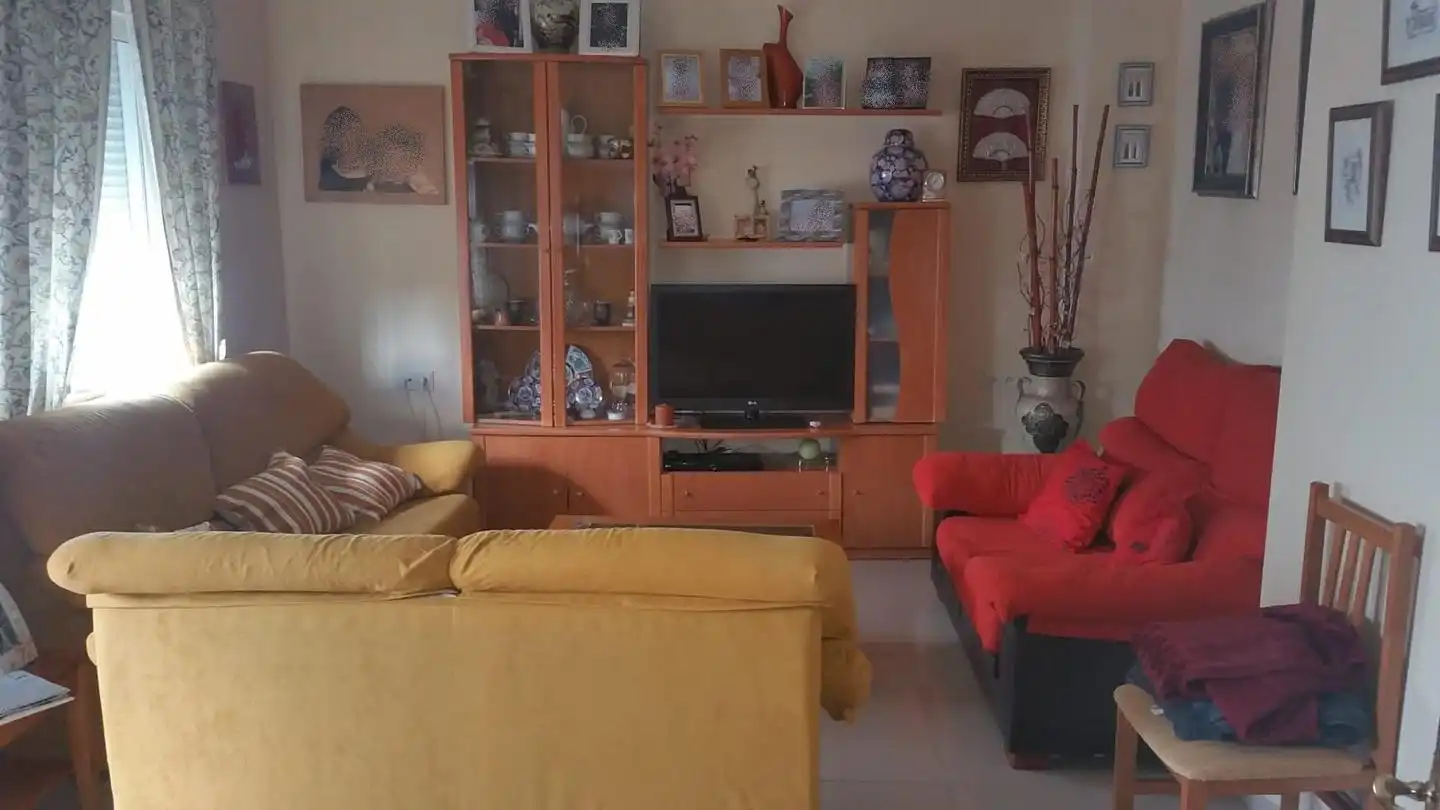 Sala de estar de Planta baja en venta en Pinos Puente con Piscina comunitaria