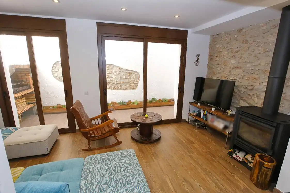 Sala de estar de Casa adosada en venta en Alcanar con Calefacción, Jardín privado y Terraza