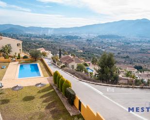 Exterior view of Single-family semi-detached for sale in Xaló  with Air Conditioner, Terrace and Swimming Pool