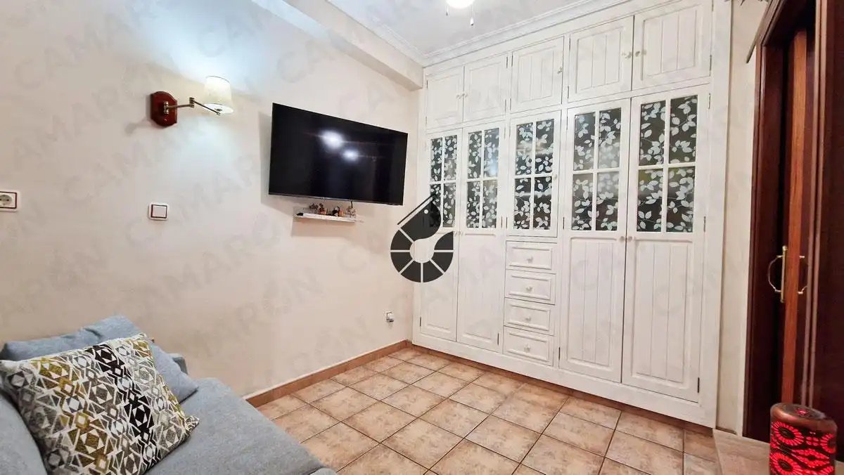 Sala d'estar de Casa adosada en venda en Coria del Río amb Aire condicionat, Terrassa i Balcó
