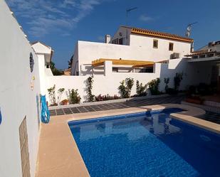 Swimming pool of Single-family semi-detached for sale in Pilar de la Horadada  with Air Conditioner, Private garden and Terrace