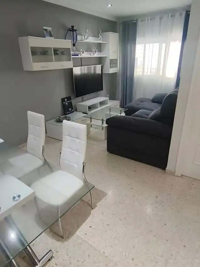 Sala de estar de Casa adosada en venta en Cartaya con Aire acondicionado