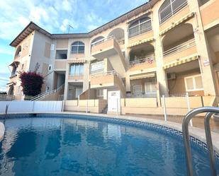 Swimming pool of Flat for sale in Torrevieja  with Air Conditioner, Furnished and Balcony