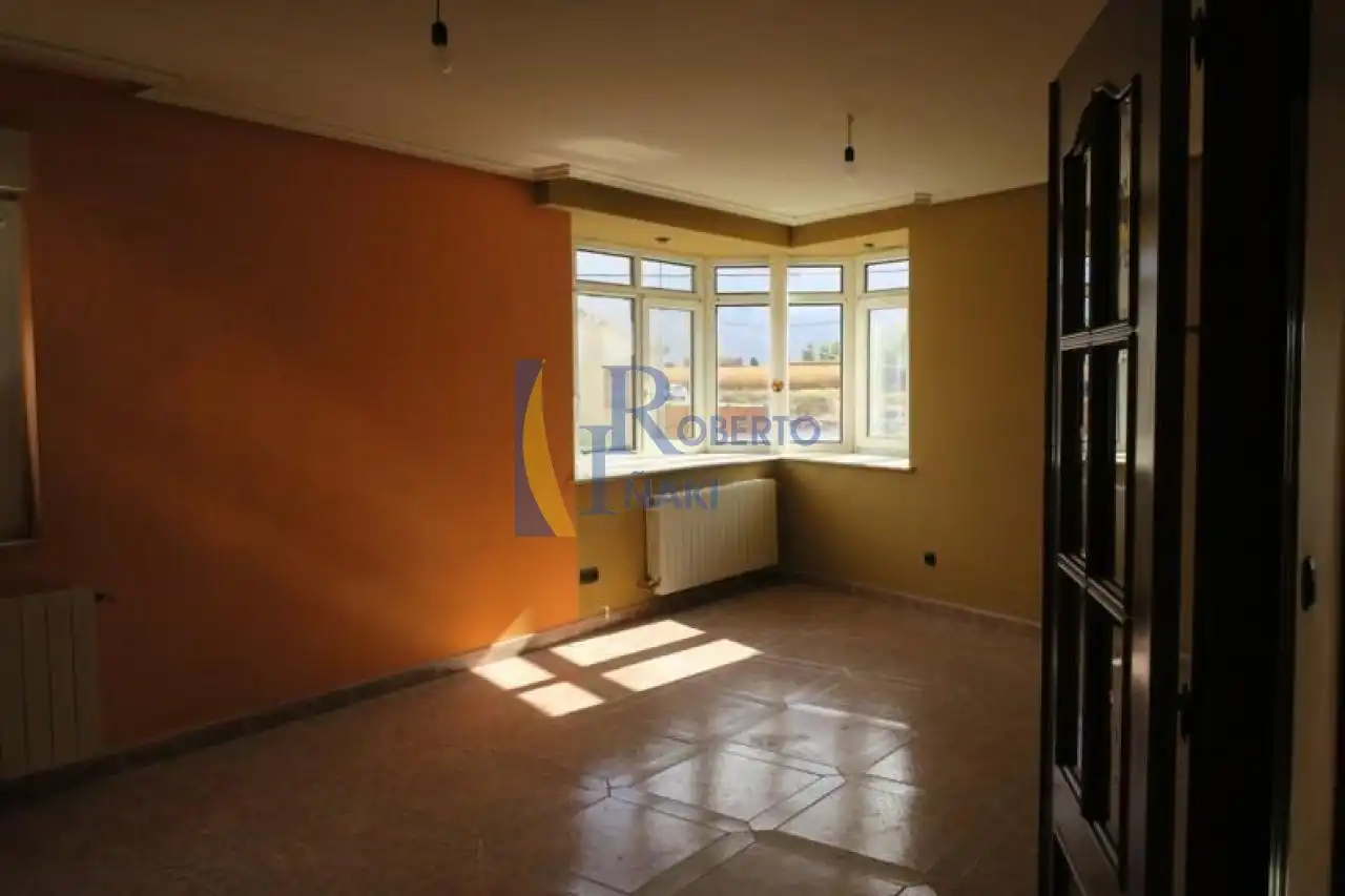 Sala de estar de Casa adosada en venta en Villaornate y Castro con Jardín privado