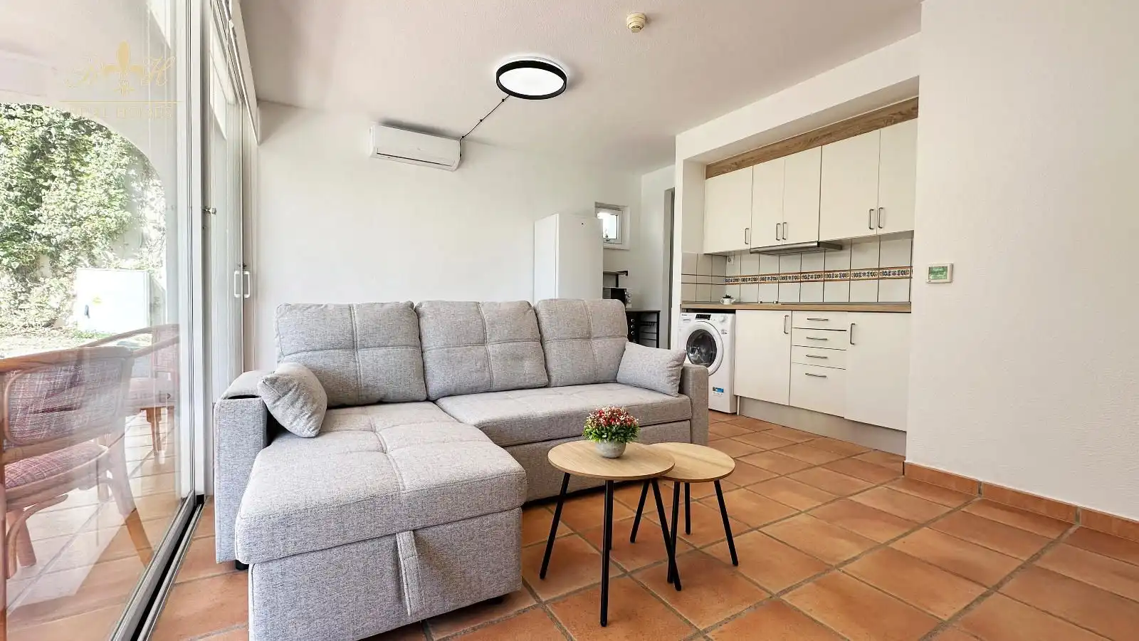 Sala de estar de Piso de alquiler en L'Alfàs del Pi con Aire acondicionado, Terraza y Piscina