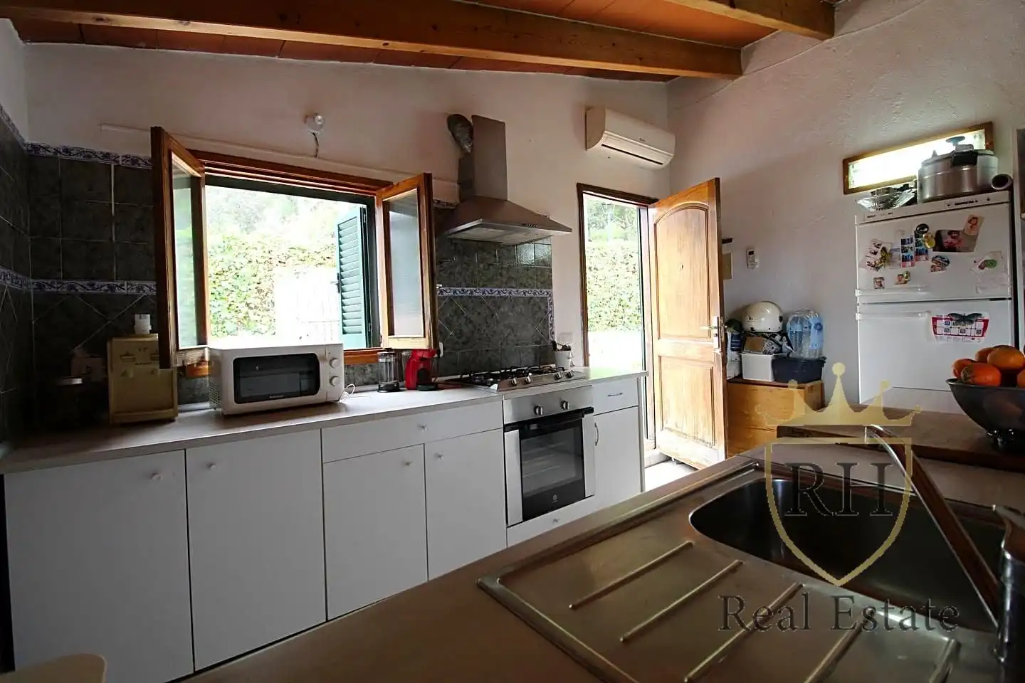 Cuina de Casa o xalet en venda en Pollença amb Aire condicionat, Jardí privat i Terrassa