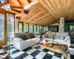 Sala d'estar de Casa o xalet en venda en El Escorial amb Aire condicionat i Piscina