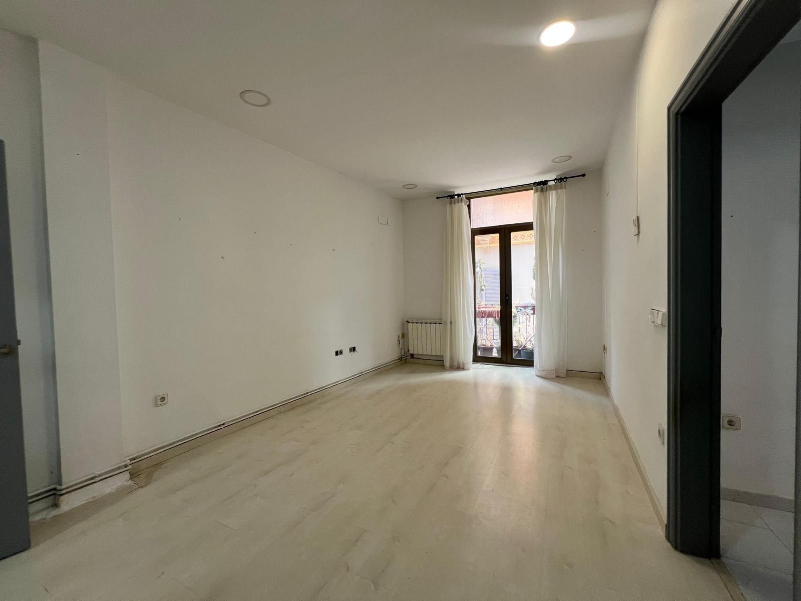 Living room of Planta baja for sale in Llagostera  with Heating and Balcony