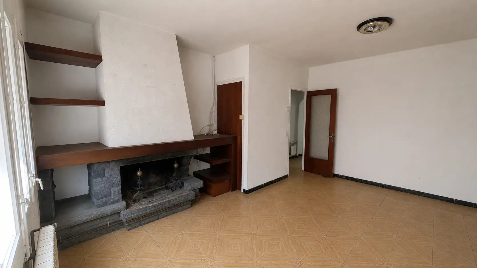 Sala d'estar de Casa adosada en venda en Sant Joan Les Fonts amb Calefacció, Terrassa i Forn