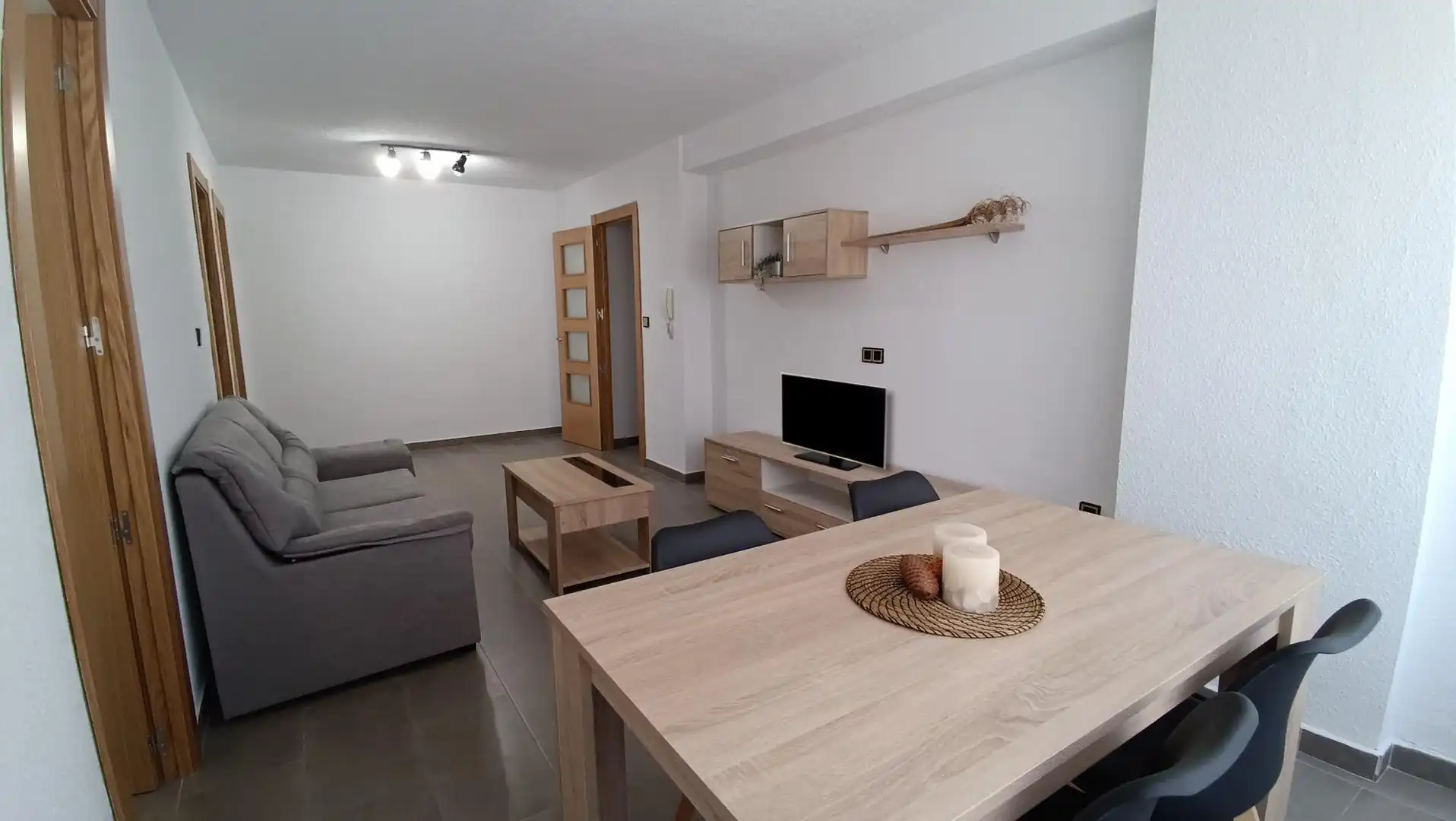 Sala de estar de Piso para compartir en Granada con Aire acondicionado, Terraza y Amueblado