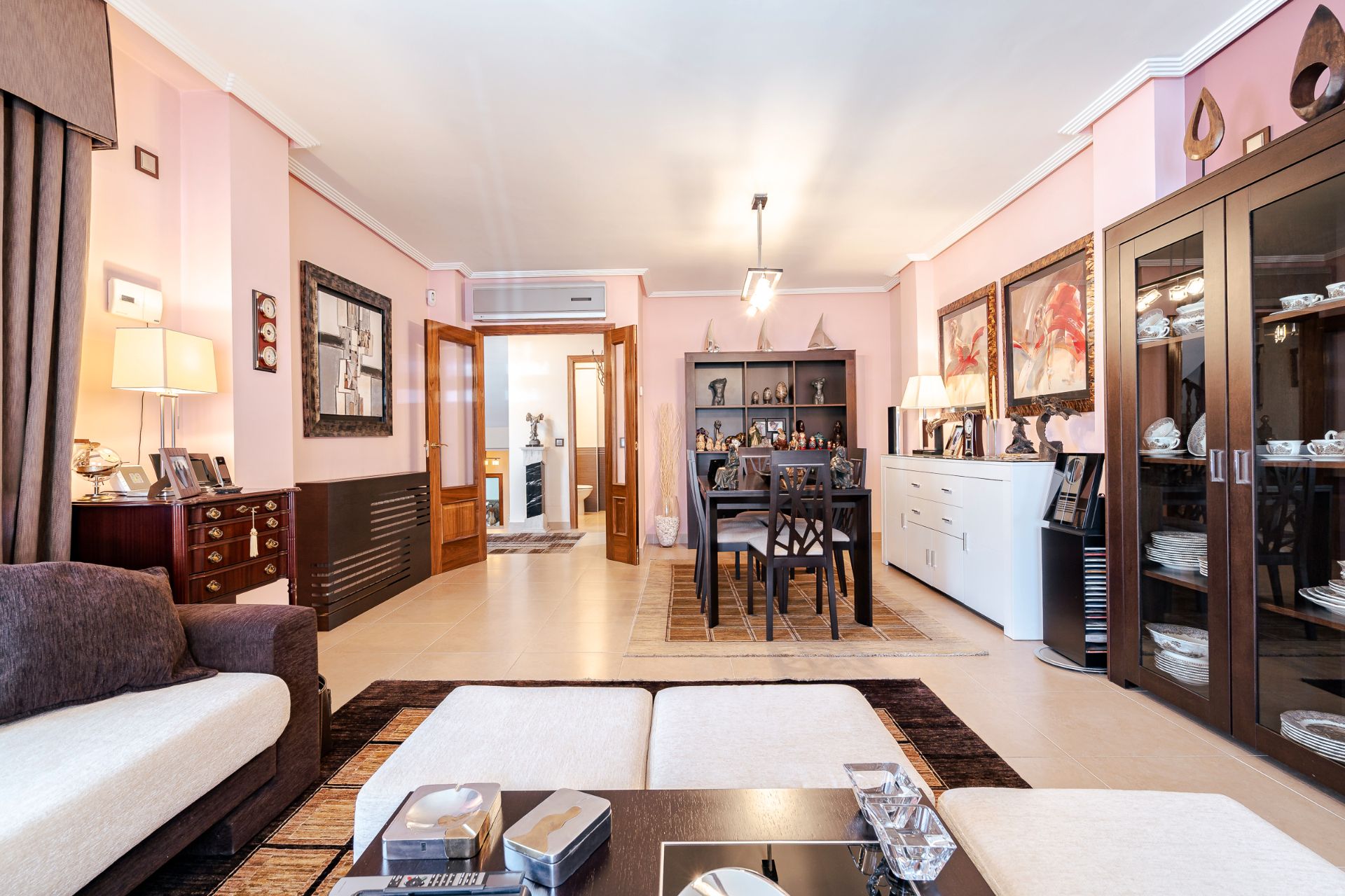 Sala d'estar de Casa adosada en venda en Meco amb Aire condicionat, Jardí privat i Piscina