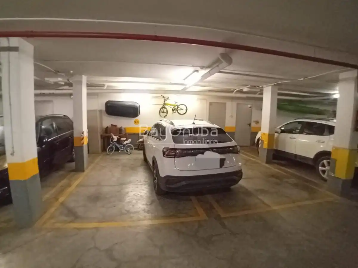 Parking de Casa adosada en venta en Huelva con Trastero y Piscina