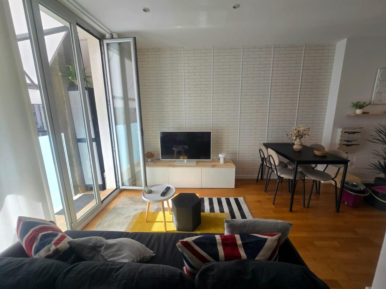 Sala d'estar de Dúplex de lloguer en  Palma de Mallorca amb Aire condicionat, Calefacció i Terrassa