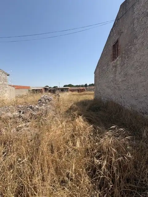 Casa adosada en venda en San Miguel del Arroyo amb Jardí privat