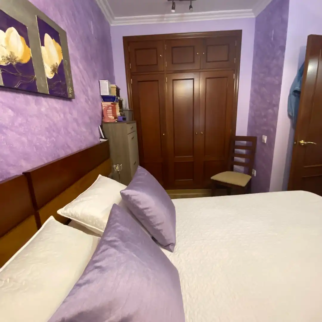 Habitación de Casa adosada en venta en Dos Hermanas con Aire acondicionado, Parquet y Trastero