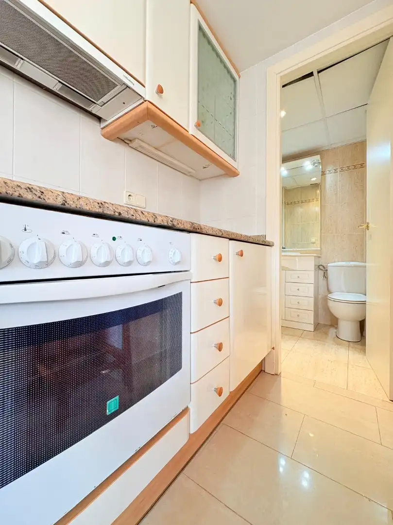 Cocina de Dúplex en venta en Torredembarra con Aire acondicionado, Terraza y Horno
