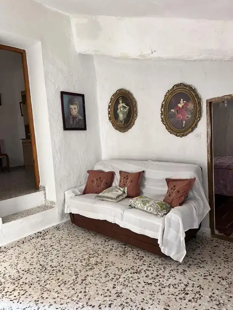 Sala d'estar de Casa adosada en venda en Baza amb Balcó