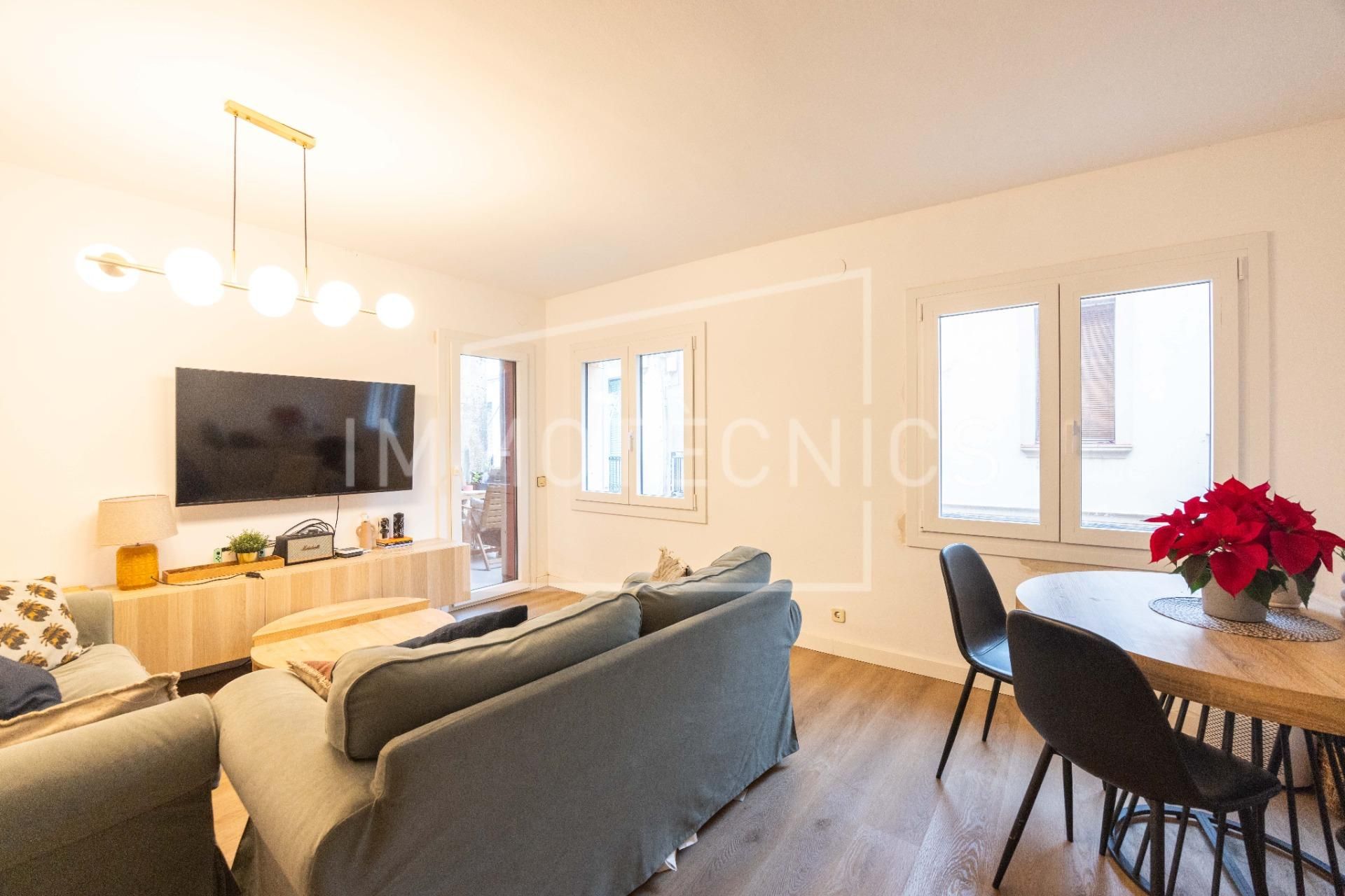 Living room of Flat for sale in Canet de Mar  with Heating, Parquet flooring and Terrace