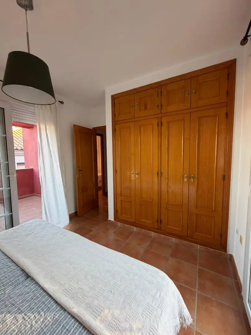 Habitación de Casa adosada en venta en Islantilla con Jardín privado, Terraza y Trastero