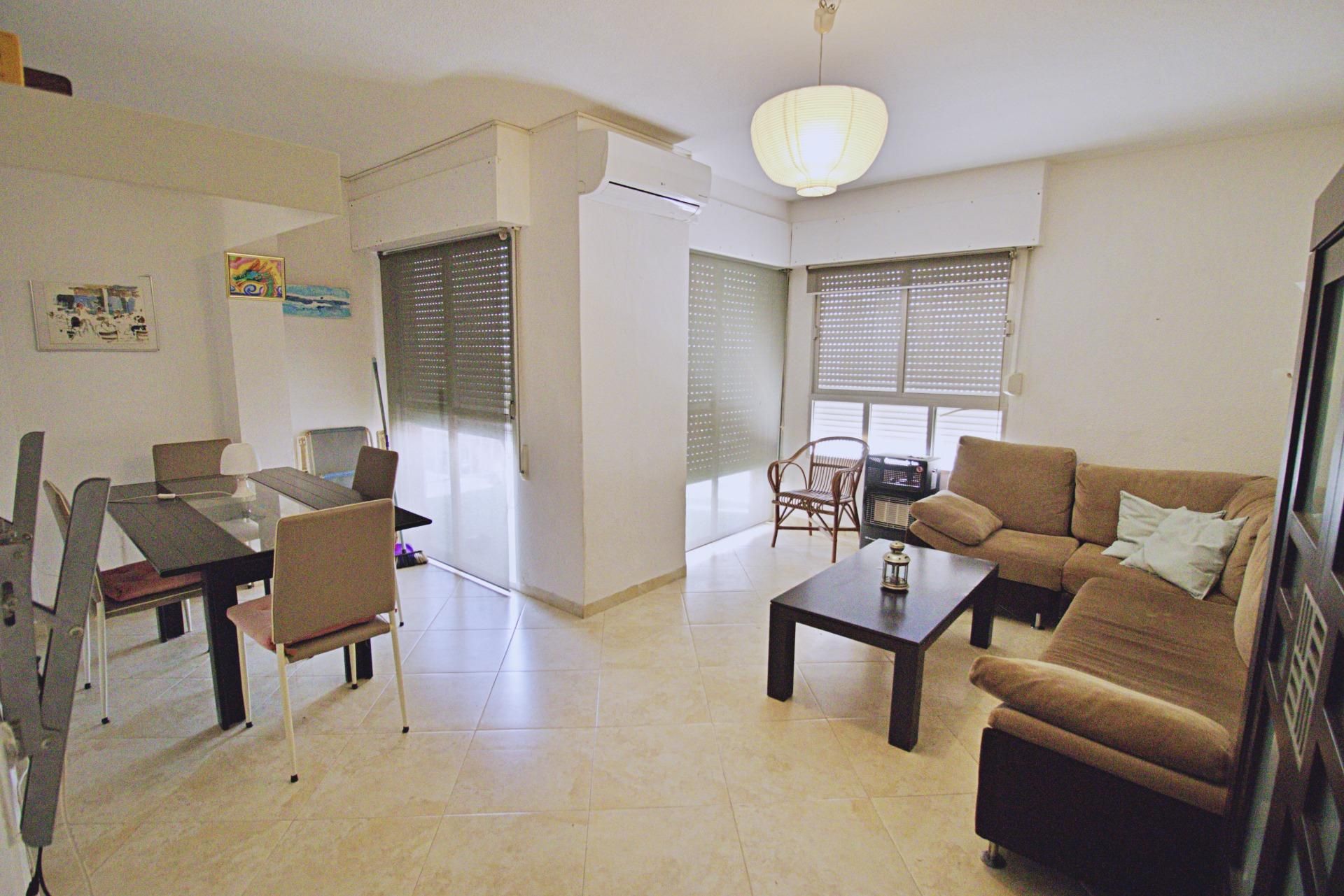 Living room of Flat for sale in Torrevieja  with Air Conditioner, Terrace and Storage room