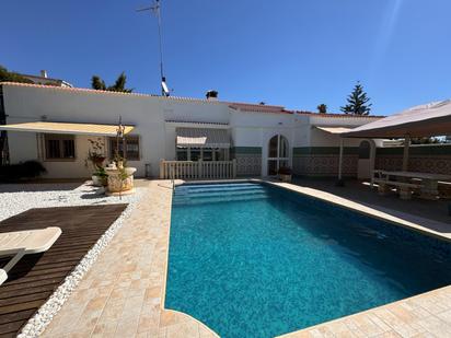 Swimming pool of House or chalet for sale in Benalmádena  with Air Conditioner, Heating and Private garden