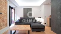 Living room of Flat for sale in  Madrid Capital  with Air Conditioner and Balcony