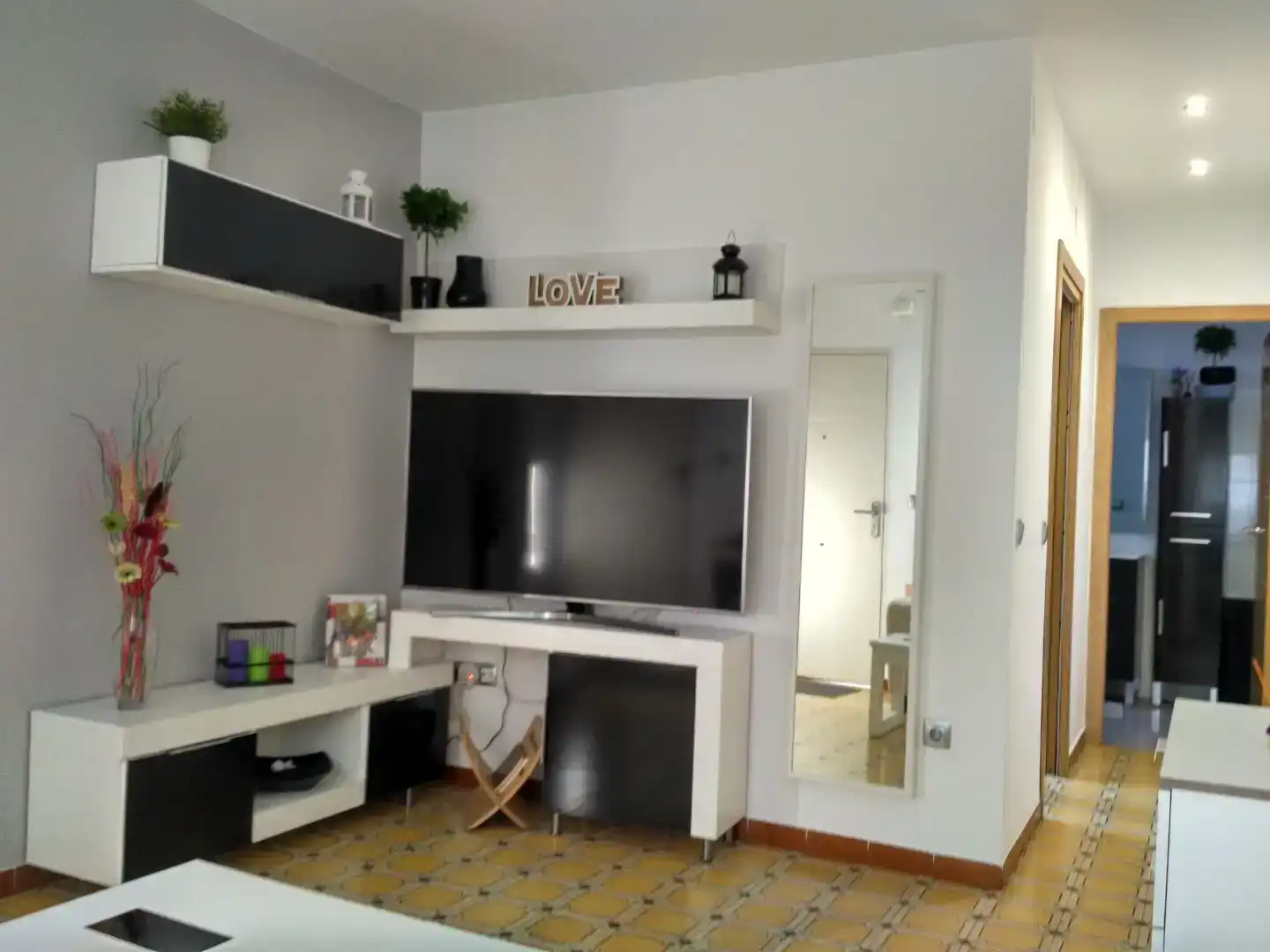 Sala d'estar de Casa adosada de lloguer en Punta Umbría amb Aire condicionat, Moblat i Rentadora