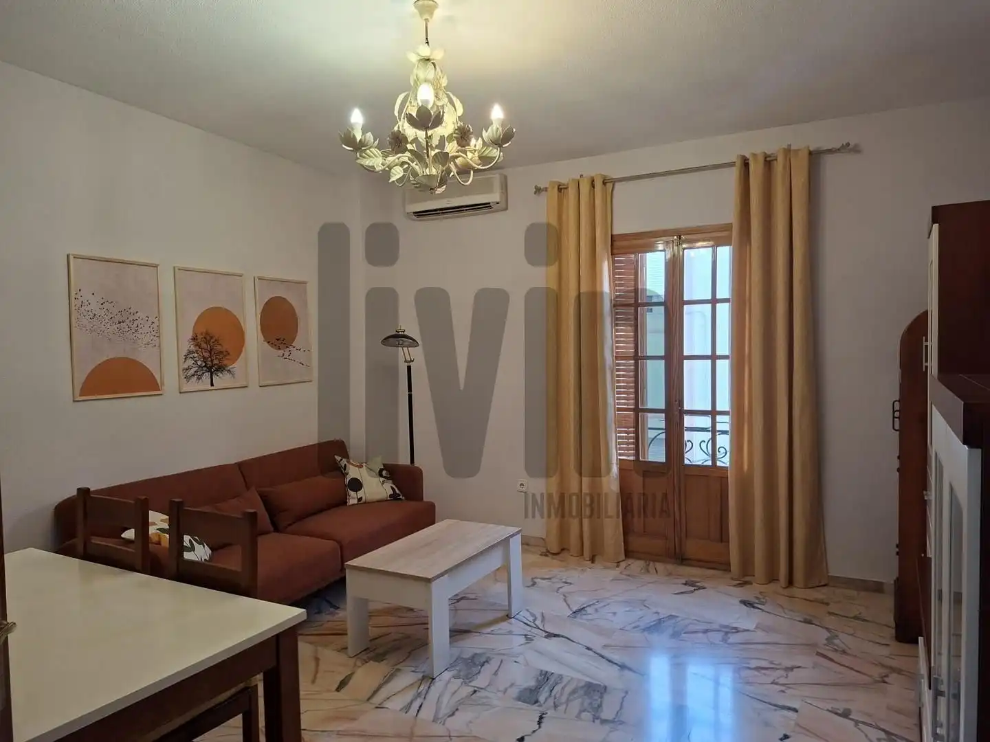 Sala d'estar de Pis de lloguer en Jaén amb Aire condicionat i Moblat