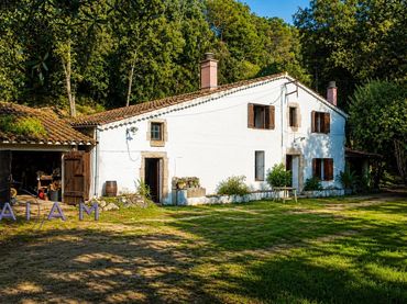 Casa rustica con giardino in vendita a Sant Cebrià de Vallalta