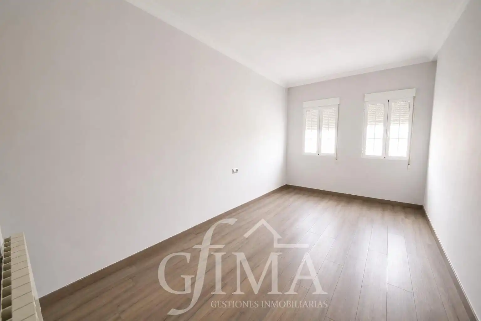 Habitación de Casa adosada en venta en Tomelloso con Calefacción y Trastero